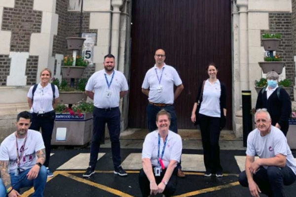 hep C staff outside prison